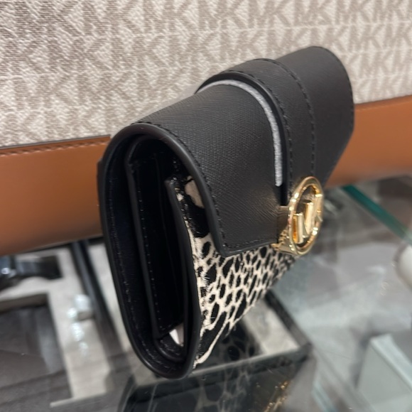 MICHAEL KORS
Carmen Medium Flap Bifold Faux Fur-Leather Wallet
Black 
NWT - Picture 3 of 16